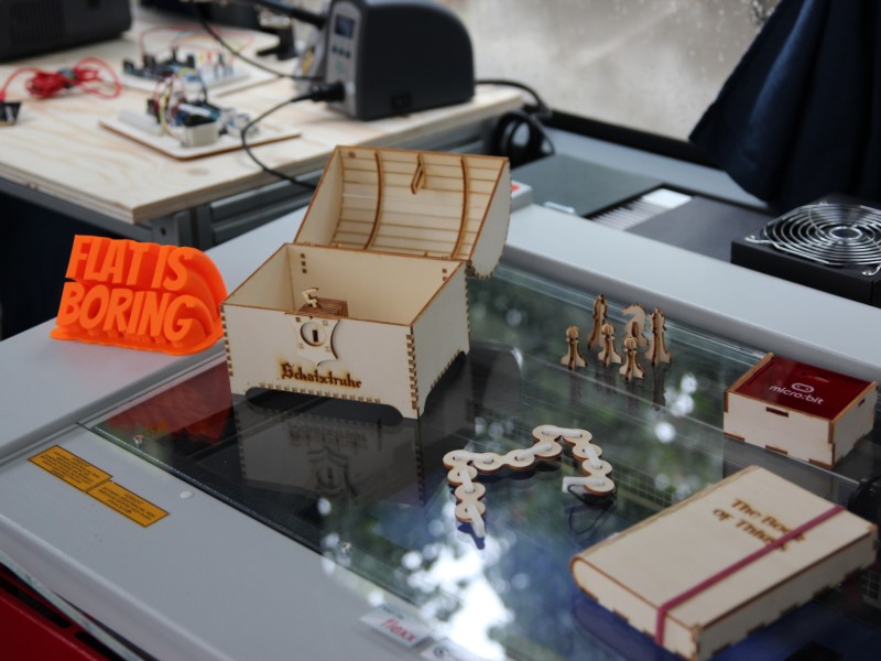 : Objects made with 3D printer and laser cutter.