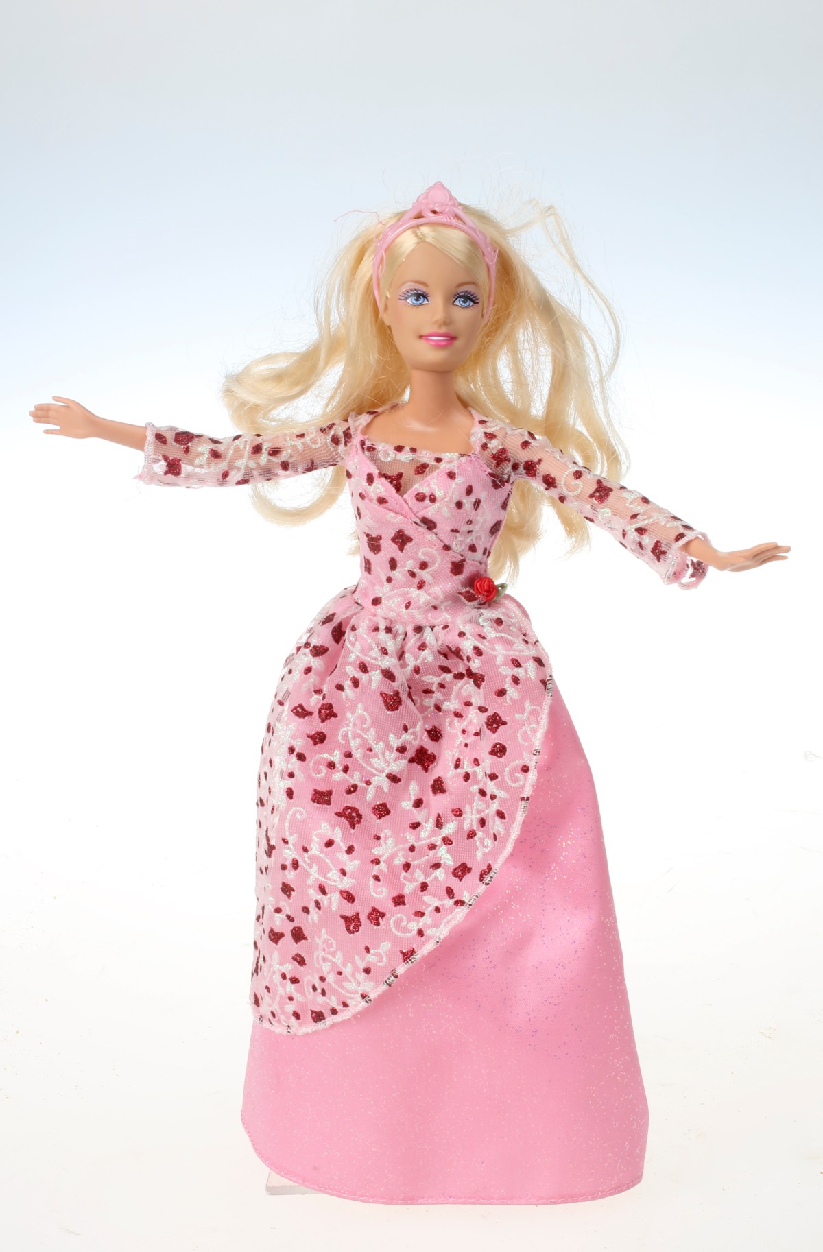: Eine "traditionelle" Barbie-Puppe in pinker Bekleidung.