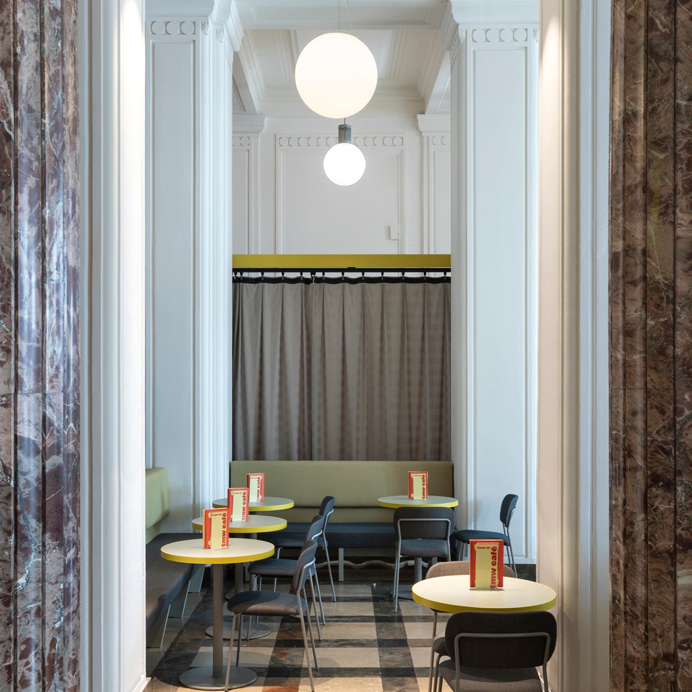 View into a seating area of the tmw café : 