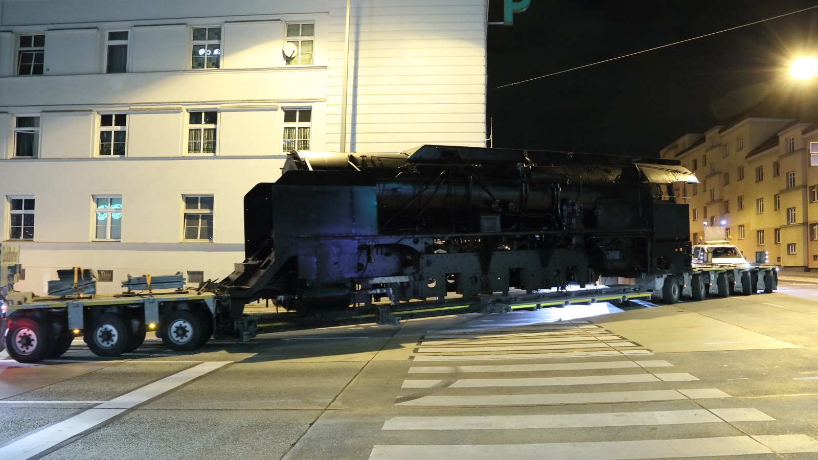 The 12.10 locomotive loaded on a low-loader on its way to the Technisches Museum Wien